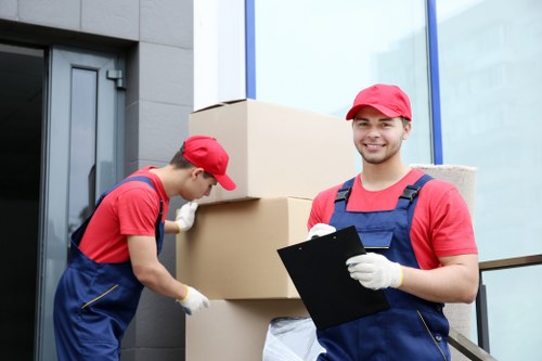 Man with van removal service helping with a home move in Finsbury Park