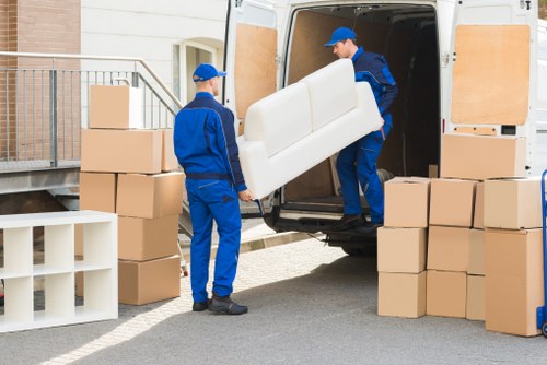 Moving team loading furniture into a van near Finsbury Park