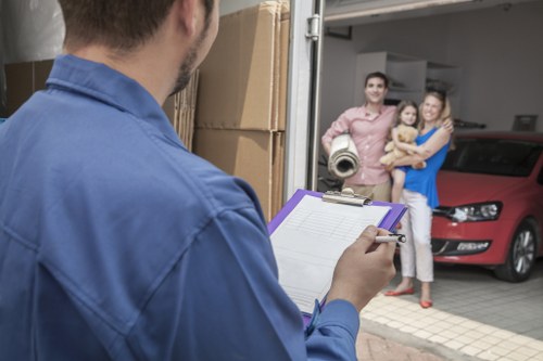 Packed boxes and furniture prepared for a man and van move in Finsbury Park