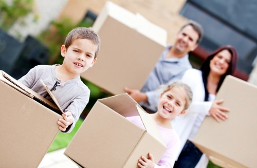 Packed boxes and furniture ready for transport from a North London home