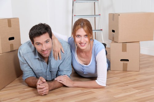 Loading household items into a removal van