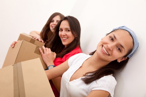 Packing boxes and furniture for a home move in North London