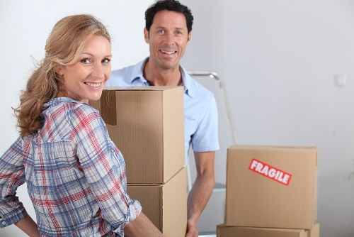 Furniture and boxes being loaded into a moving van in North London