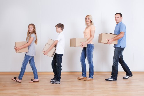 Packed office furniture and equipment ready for local transport