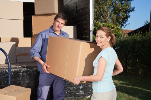 A van loading recyclable furniture and donation items for a local transfer station